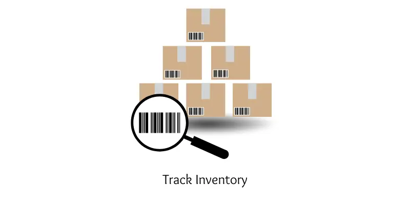 Tracking inventory with a handheld scanner and barcode labels on stacked boxes.