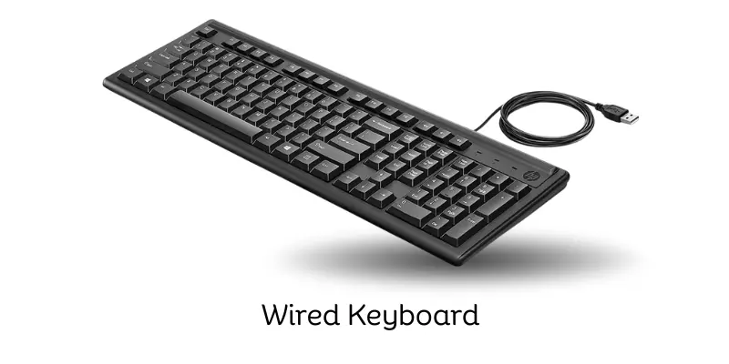 Black wired keyboard with USB connector and full-size key layout.